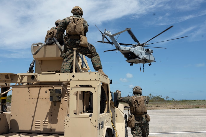 U.S. Marines with 2nd DSB execute external lifts with a JLTV
