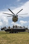 U.S. Marines with 2nd MAW execute external lifts and helocasting alongside U.S. Army Special Warfare Training Group (Airborne)