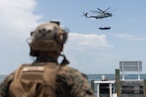 U.S. Marines with 2nd MAW execute external lifts and helocasting alongside U.S. Army Special Warfare Training Group (Airborne)