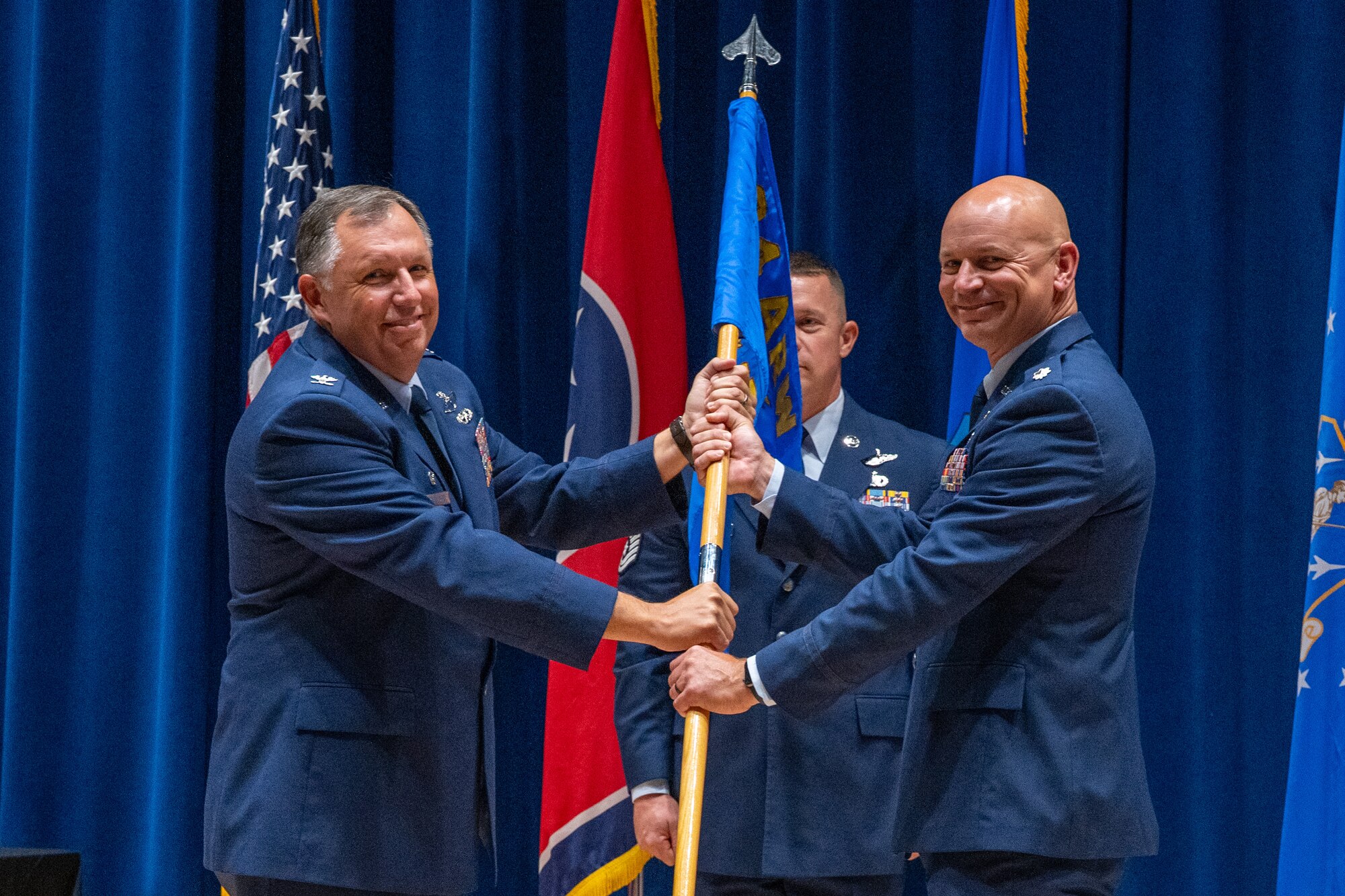 U.S. Air National Guard Lt. Col. Benjamin Brooks accepts the 134th Operations Group guidon from Col. Ronald Selvidge, 134th Air Refueling Wing commander, symbolizing the formal transfer of command of the group during a ceremony at McGhee Tyson ANG Base, Tennessee, Aug. 3, 2025.