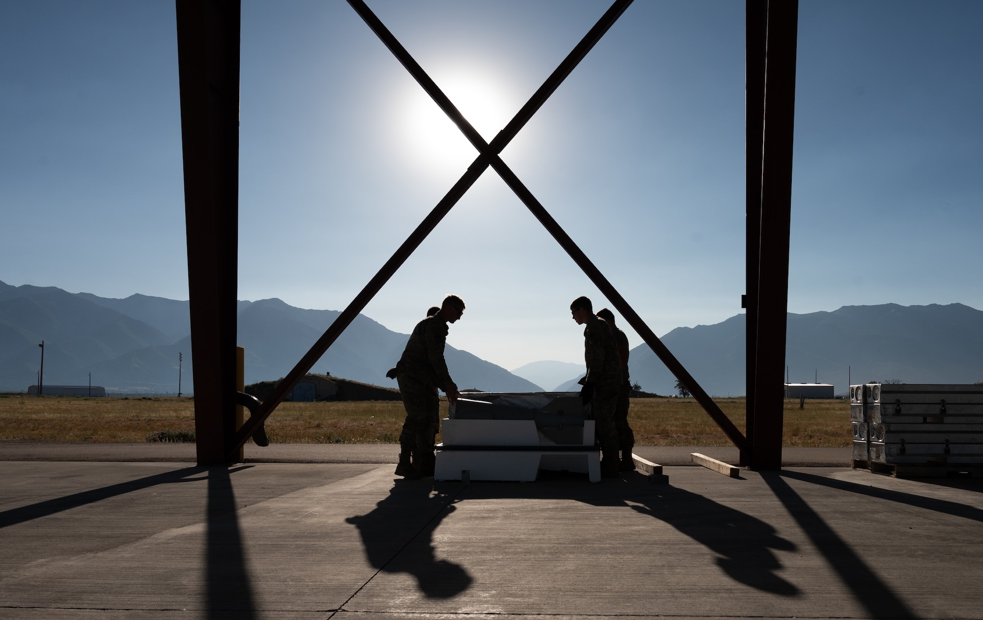 A photo of munitions Airmen building a GBU-56