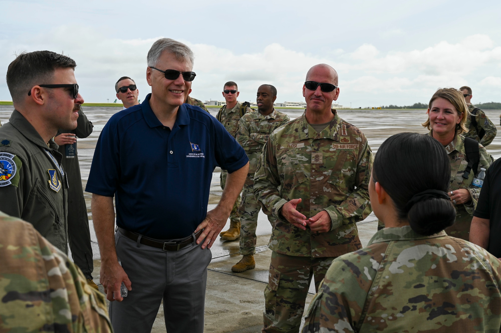Secretary of the Air Force Troy Meink, second from left, Chief Master Sgt. of the Air Force David Flosi and Chief Master Sgt Kathleen McCool, Pacific Air Forces command chief, receive a briefing from Lt. Col. Erik Gonsalves, left, 355th Mission Generation Force Element commander, in Guam during exercise Resolute Force Pacific (REFORPAC) 25, July 28, 2025.