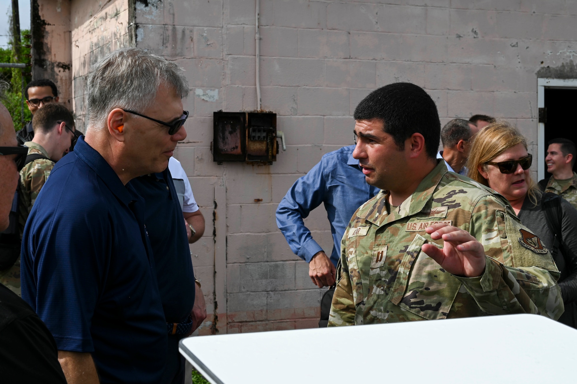 Secretary of the Air Force Troy Meink, left, receives a brief from Capt. Dominic Azar, 354th Air Expeditionary Wing A6 director, about communications in Guam during exercise Resolute Force Pacific (REFORPAC) 25, July 28, 2025.