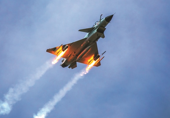 People’s Liberation Army Air Force J-10 fighter jet under Southern Theater Command fires rockets at simulated ground targets during live-fire flight training exercise.