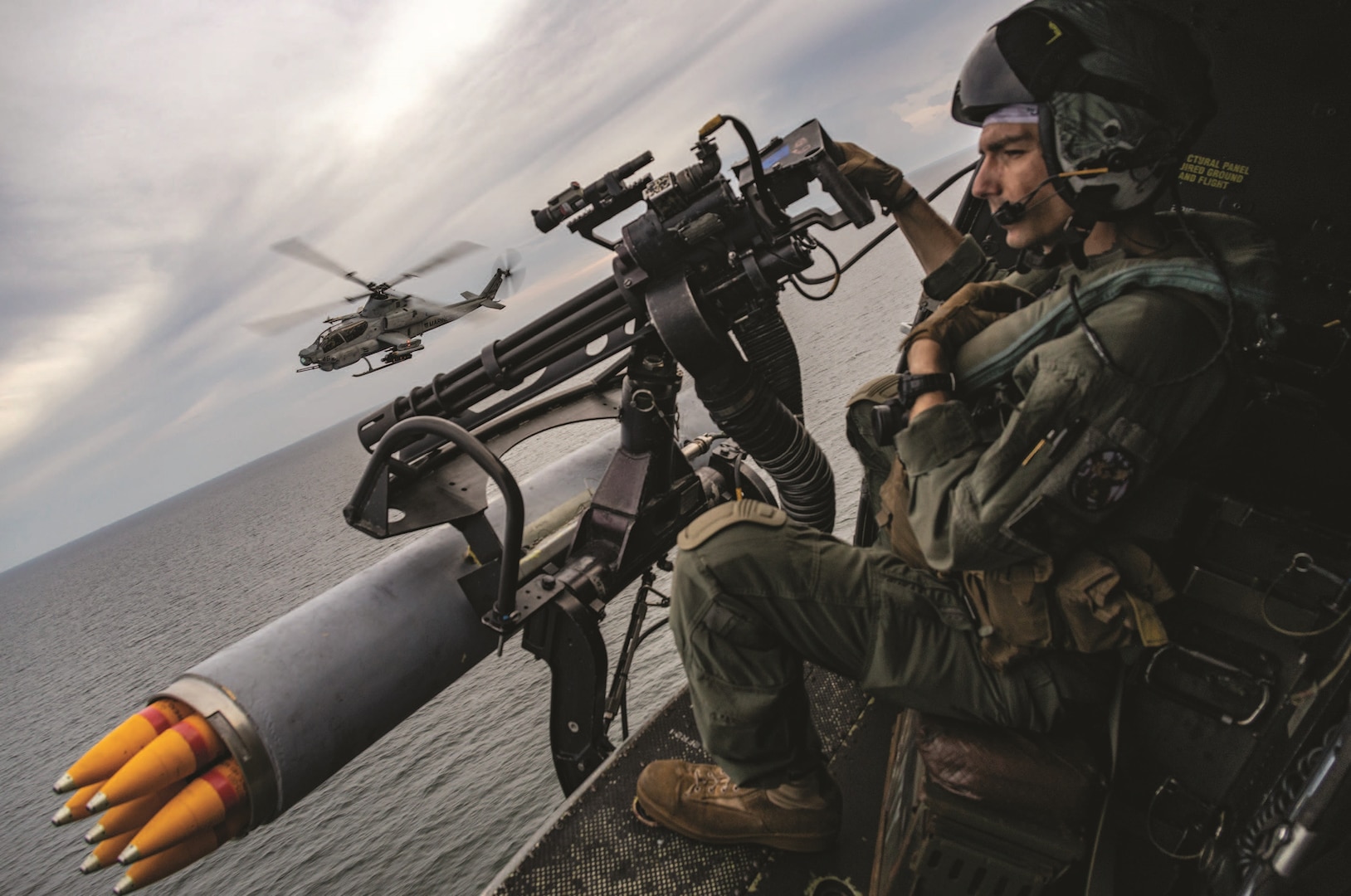 Marine Corps Sergeant Raylin Carter, aerial observer with Marine Medium Tiltrotor Squadron 362 (Reinforced), 13th Marine Expeditionary Unit, participates in flight operations with AH-1Z Viper pilots during transit of Malacca Strait.