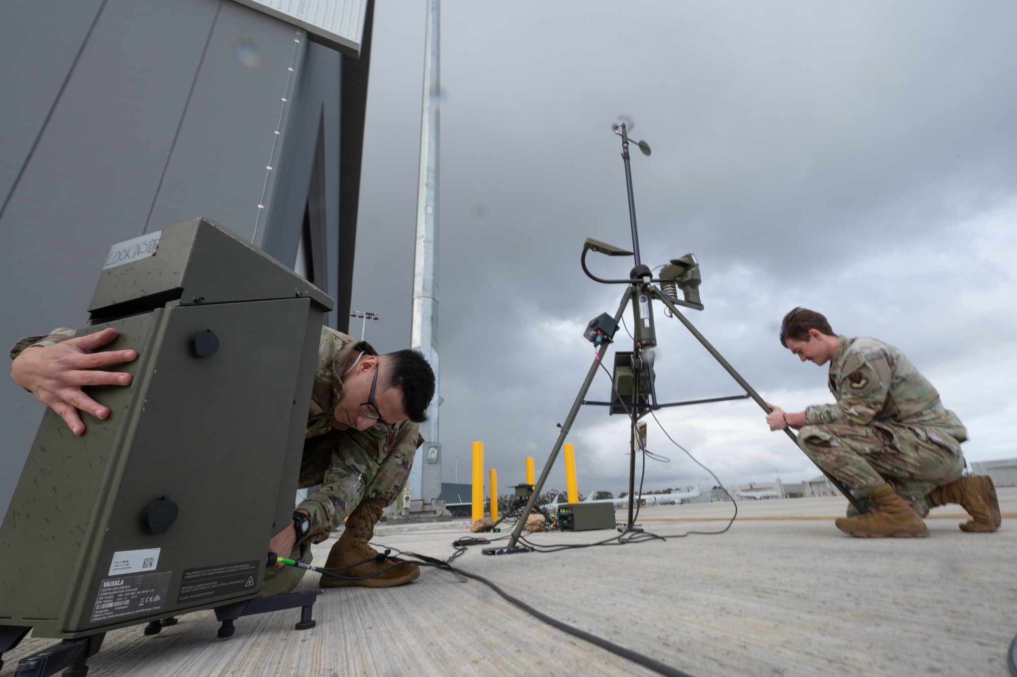 USAF members set up a Tactical Meteorological Observing System