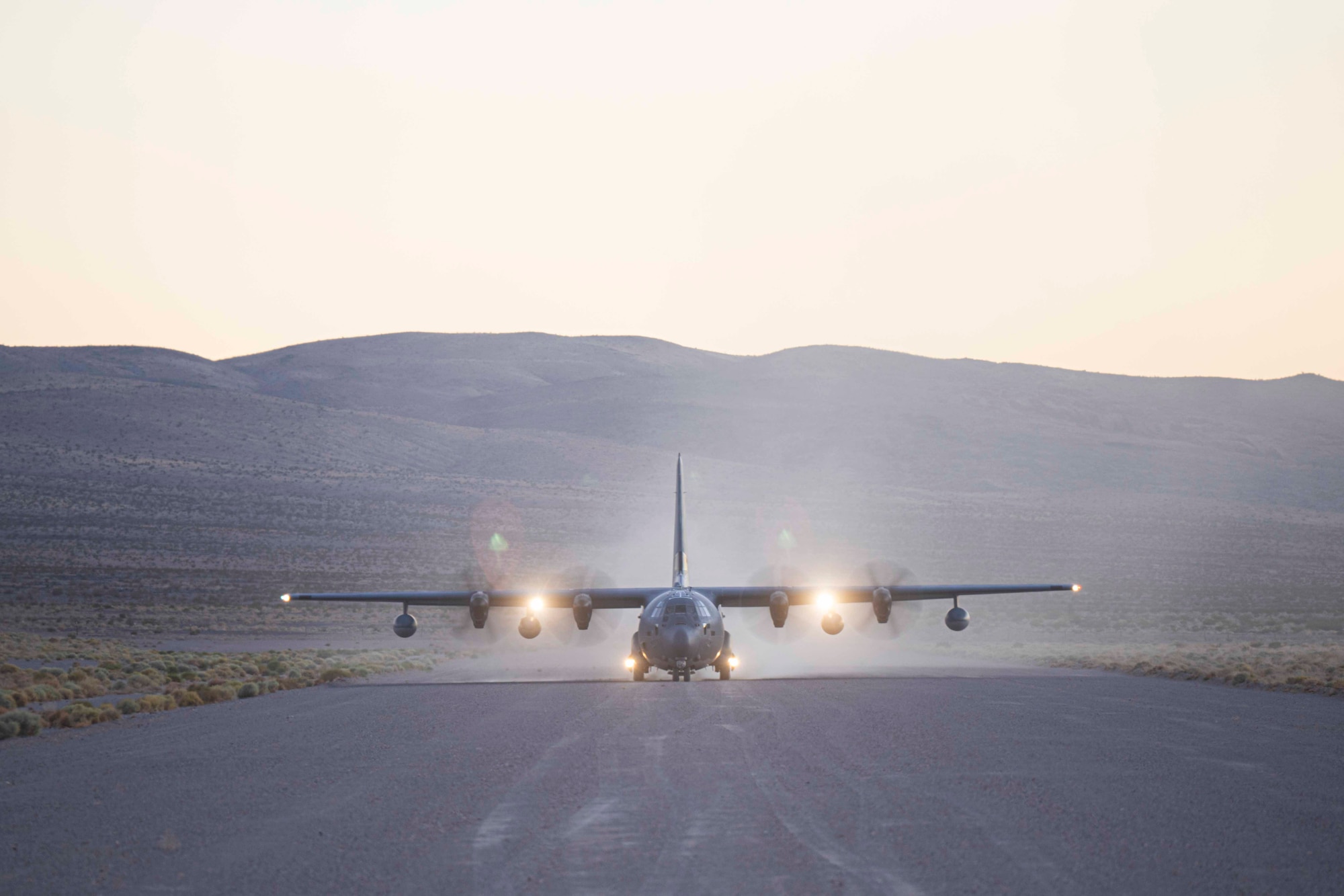 U.S. Air Force MC-130J Commando II assigned to AFSOC taxis on an airfield in California during Emerald Warrior 25.2.