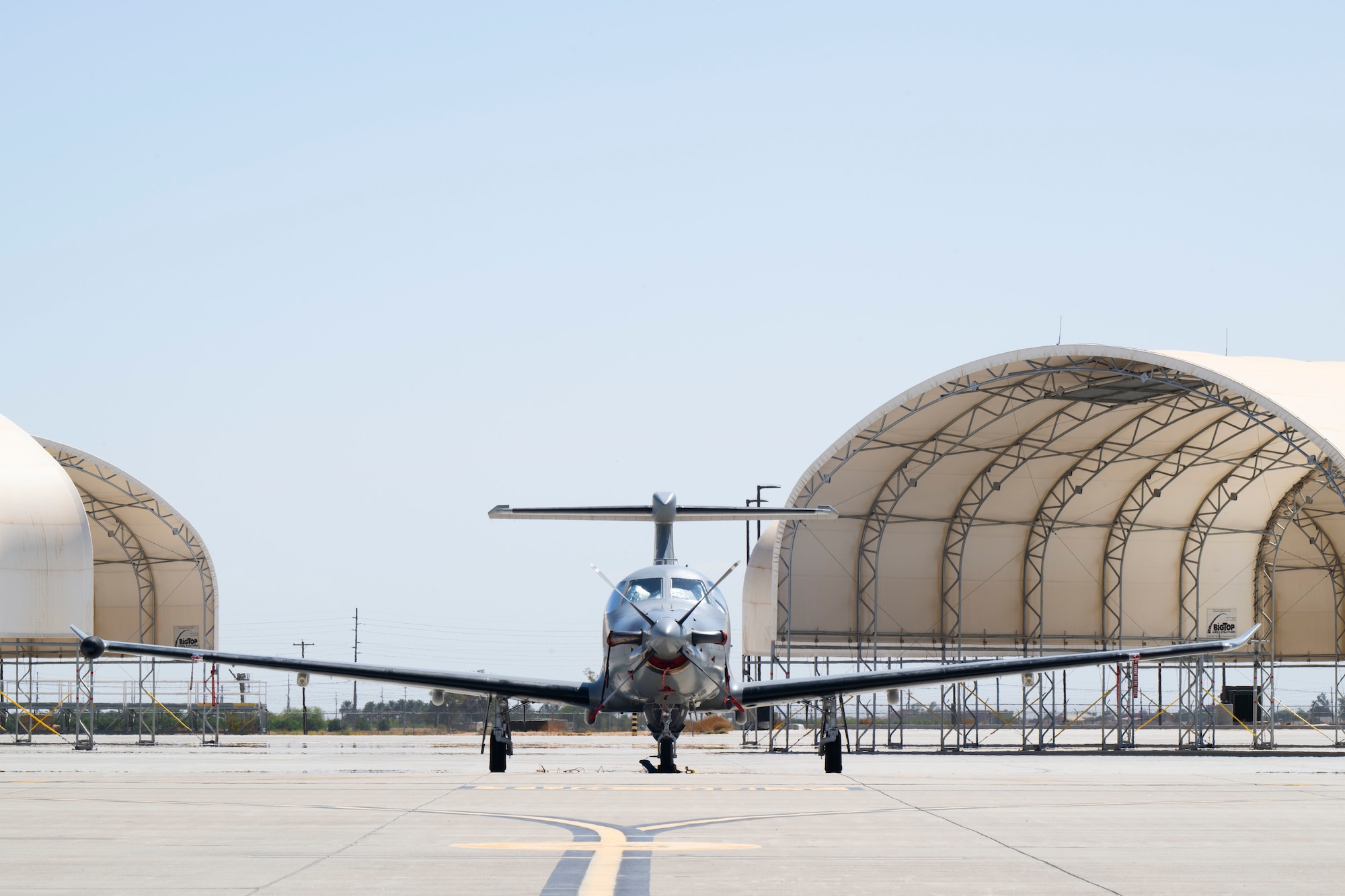 A U.S. Air Force U-28A Draco assigned to AFSOC sits on the flight line during Emerald Warrior 25.2.