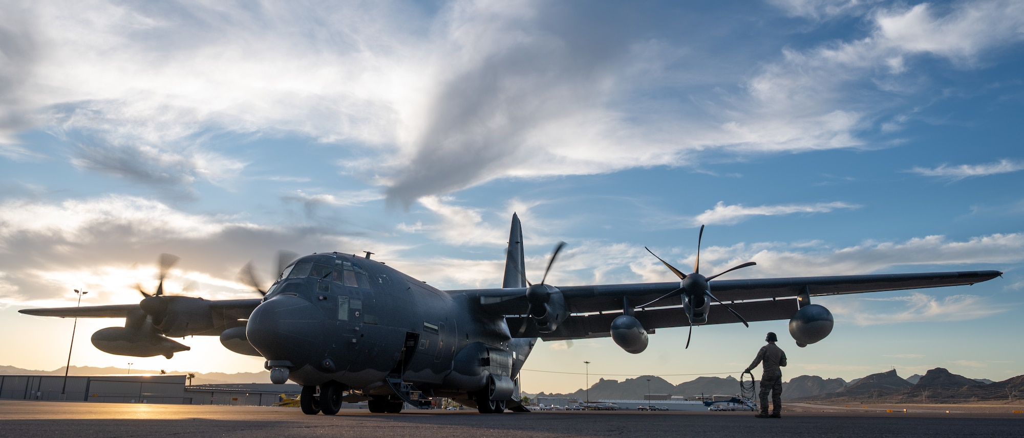 A U.S. Air Force Air Commando conducts engine startup checks on a MC-130J Commando II aircraft during Emerald Warrior 25.2.