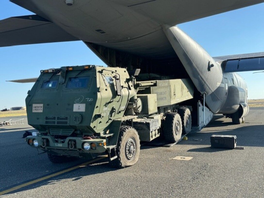 A High Mobility Arillery Rocket System (HIMARS) launcher crew from Alpha Battery, 1st Battalion, 623rd Field Artillery, completed a joint force, HIMARS rapid infiltration (HIRAIN) training with the U.S. Air Force Special Operations Task Group (USAF SOTG) at Ali Al Salem Air Base, Kuwait.