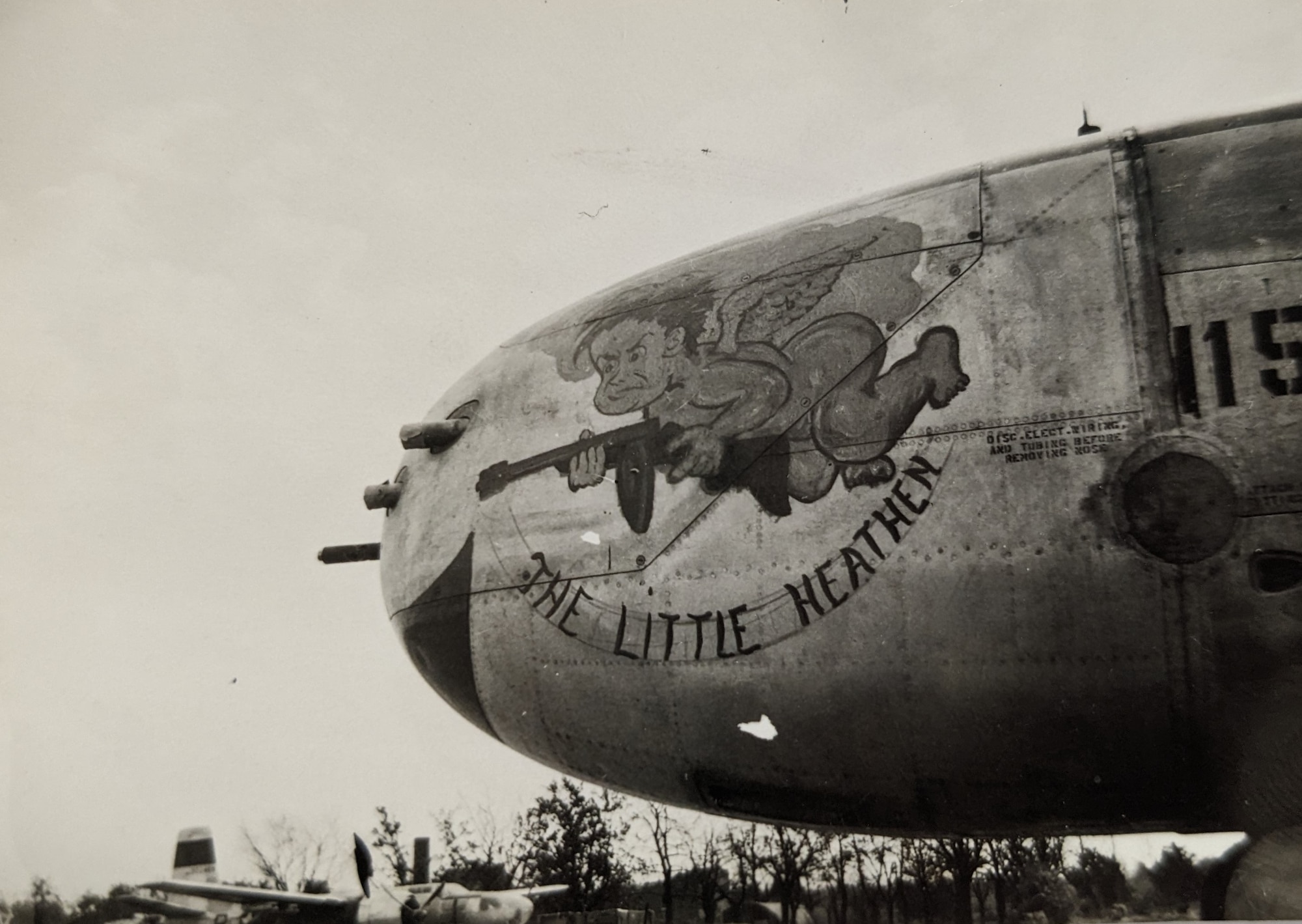 Historic image in black and white of the A-26 "The Little Heathen" in Europe during WWII.