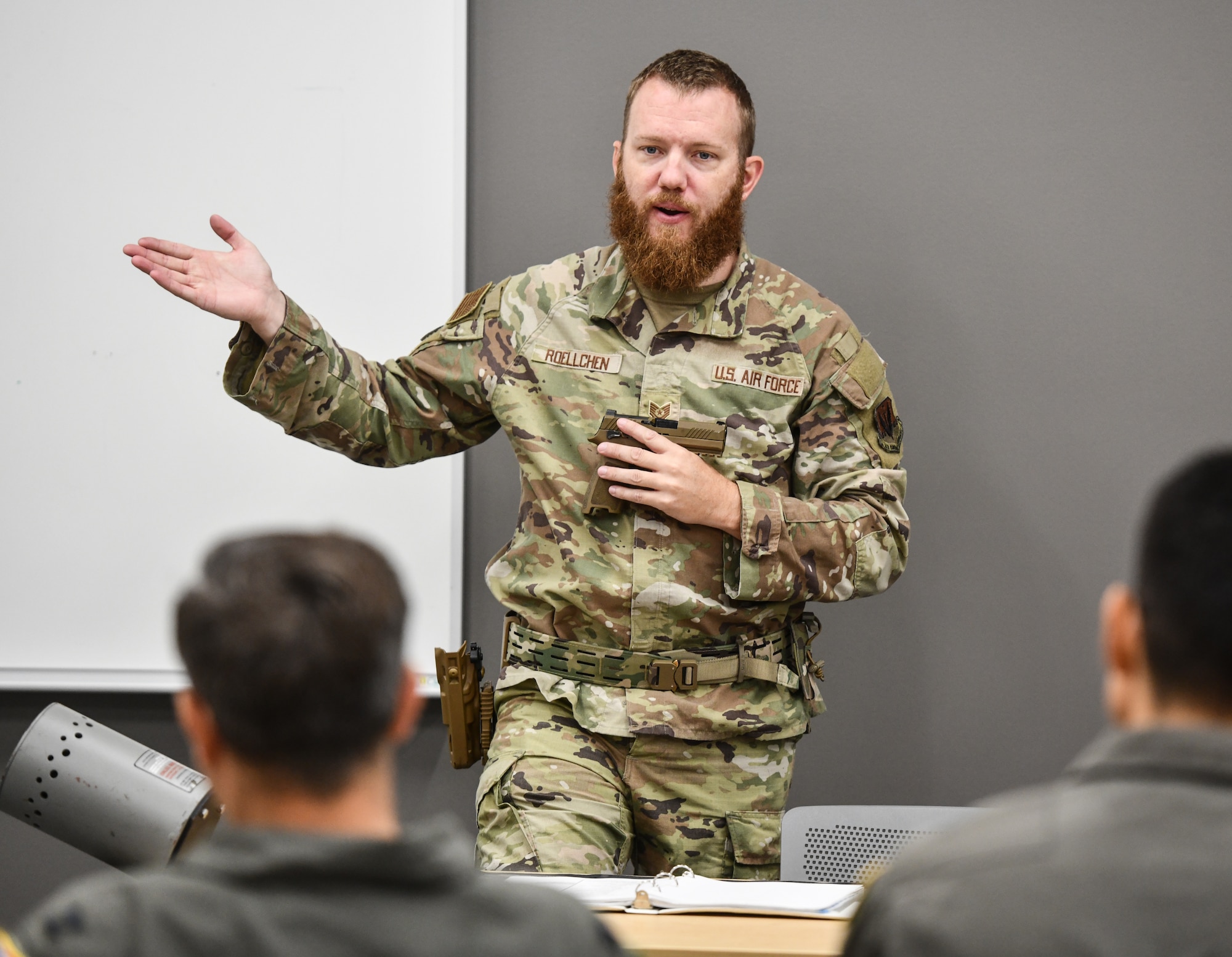 Staff Sgt. John Roellchen, 55th Security Forces Squadron, instructs a combat arms training and maintenance class at Offutt Air Force Base, Aug. 4, 2025. (U.S. Air Force photo by Chad Watkins)