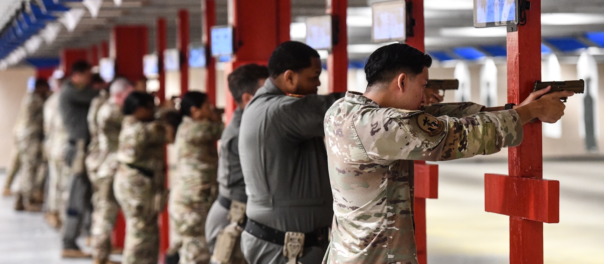 Members of a combat arms training and maintenance class at Offutt Air Force Base qualify with their weapons, Aug. 4, 2025. (U.S. Air Force photo by Chad Watkins)