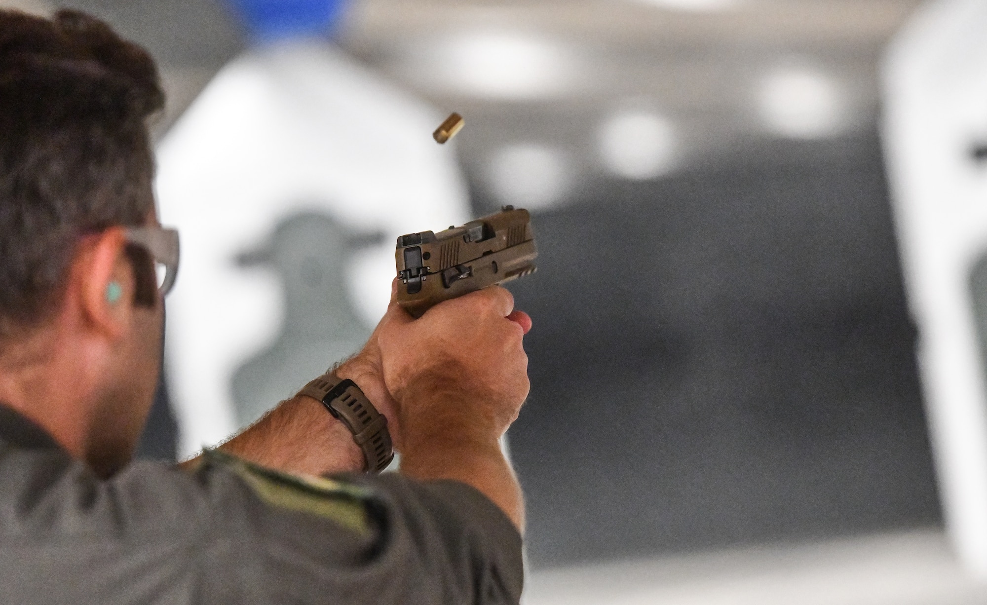Capt. Steven "Woody" Woodyard, 45th Reconnaissance Squadron, qualifies with his weapon during a combat arms training and maintenance class at Offutt Air Force Base, Aug. 4, 2025. (U.S. Air Force photo by Chad Watkins)