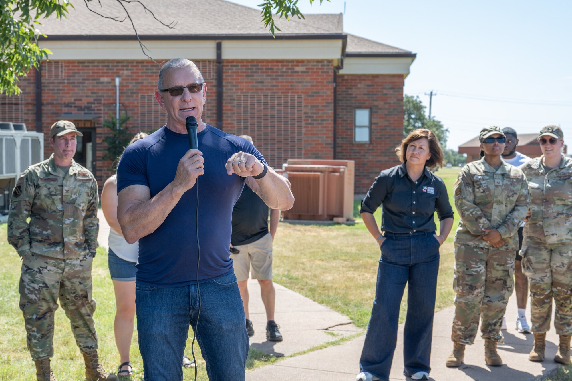 Celebrity Chef Robert Irvine speaks to Team Dyess during the “Breaking Bread with Heroes” event at Dyess Air Force Base, Texas, July 31, 2025. Irvine regularly visits military installations, hosts morale-boosting events, and advocates for greater public awareness of the challenges faced by service members. (U.S. Air Force photo by Airman Caleb Schellenberg)