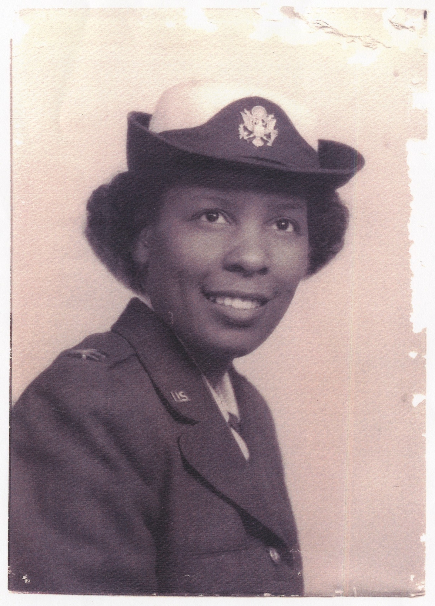 Head and shoulders shot of Fannie in uniform looking into the camera.