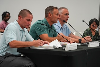 Rear Adm. Marc Williams, center, deputy commander, Navy Closure Task Force-Red Hill (NCTF-RH), is joined by Capt. Kevin McCormick, second from the right, chief of staff, NCTF-RH, and the deputy for environmental remediation, NCTF-RH, for the Community Representation Initiative (CRI) meeting in Honolulu, July 31, 2025. At the meeting, NCTF-RH leadership shared information about ongoing RHBFSF decommissioning efforts and progress with members of the CRI, representatives from the U.S. Environmental Protection Agency and Hawaii Department of Health, and members of the community. Charged with the safe decommissioning of the RHBFSF, NCTF-RH was established by the Department of the Navy as a commitment to the community and the environment. NCTF-RH continues to engage with the people of Hawaii, regulatory agencies, and other stakeholders as it safely and deliberately decommissions the facility. (U.S. Navy photo by Mass Communication Specialist 3rd Class Krystal Diaz)