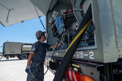 A Japan Air Self-Defense Force airman, assigned to the 4th Air Wing, starts an aircraft refuel during exercise Resolute Force Pacific (REFORPAC) 2025 at Matsushima Air Base, Japan, July 25, 2025