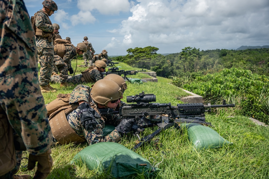 U.S. Marines with Headquarters Company, 4th Marine Regiment fire M240B machine guns during a live-fire range on Camp Schwab, Okinawa, Japan, July 30, 2025.