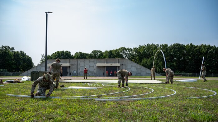 U.S. Airmen from various installations assigned to the 22nd Air Task Force (ATF) begin tent build-up as part of the advanced echelon (ADVON) team in preparation for Exercise Northern Strike 25-2 (NS 25-2) at Battle Creek Air National Guard Base, Michigan, Aug. 2, 2025.