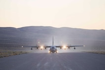 U.S. Air Force MC-130J Commando II assigned to AFSOC taxis on an airfield in California during Emerald Warrior 25.2.