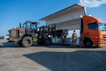 U.S. Air Force Airmen, assigned to the 421st Fighter Generation Squadron and the 721st Crisis Response team, unload cargo from a truck during exercise Resolute Force Pacific 2025 at Matsushima Air Base, Japan, July 24, 2025.