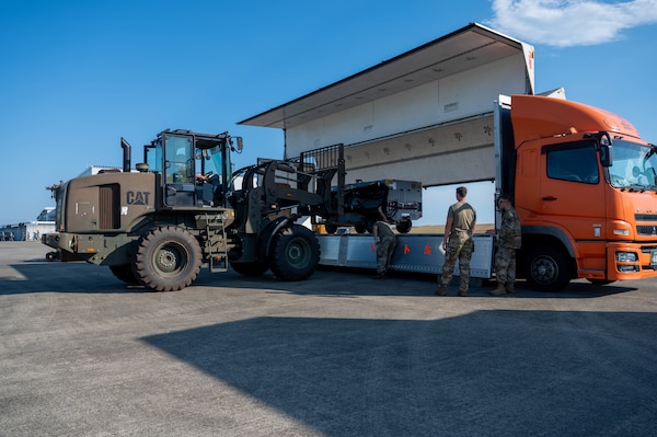 U.S. Air Force Airmen, assigned to the 421st Fighter Generation Squadron and the 721st Crisis Response team, unload cargo from a truck during exercise Resolute Force Pacific 2025 at Matsushima Air Base, Japan, July 24, 2025.