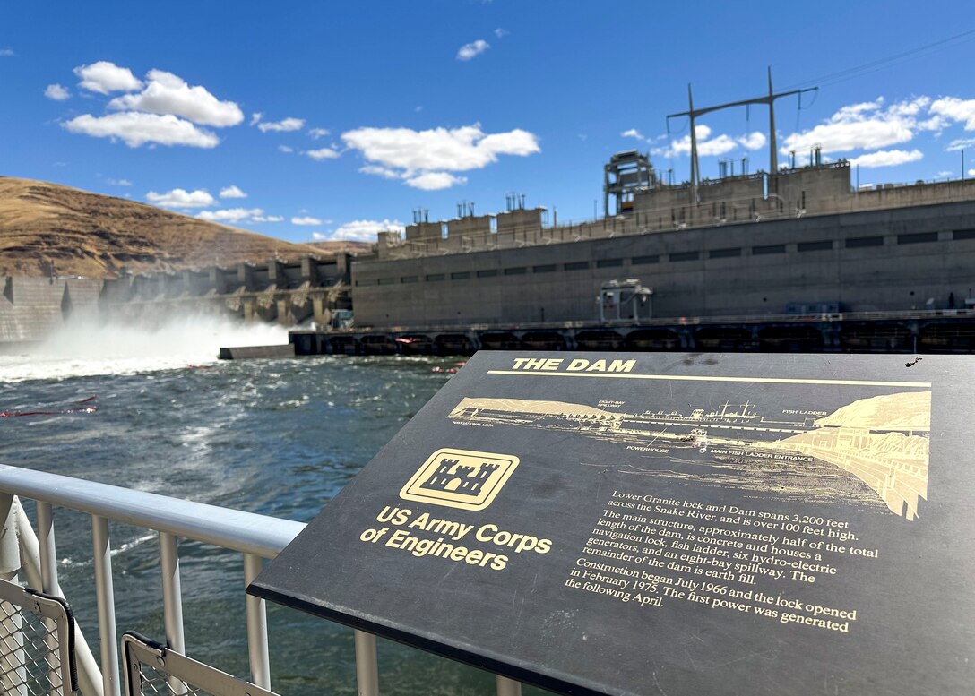 On July 10, 2025, the U.S. Army Corps of Engineers, Walla Walla District, celebrated the 3,200-feet-long Lower Granite Lock and Dam’s 50 years of service to the Pacific Northwest along with the generations of people who made it possible. 
Lower Granite Lock and Dam, located on the Snake River in southeastern Washington, includes a dam, navigation lock, powerhouse, fish ladder, and associated facilities. The project provides hydropower, navigation, flood risk management, fish and wildlife habitat, recreation, and incidental irrigation. The dam spans approximately 3,200 feet and has an effective height of 100 feet. It is a concrete gravity structure with an earthfill right abutment embankment.