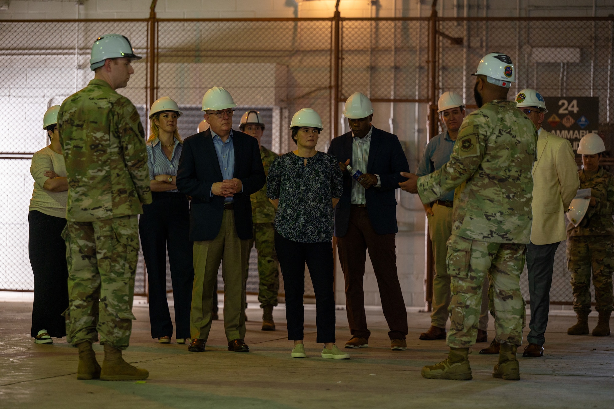 House Armed Services Committee members are briefed on spalling issues of on base facilities