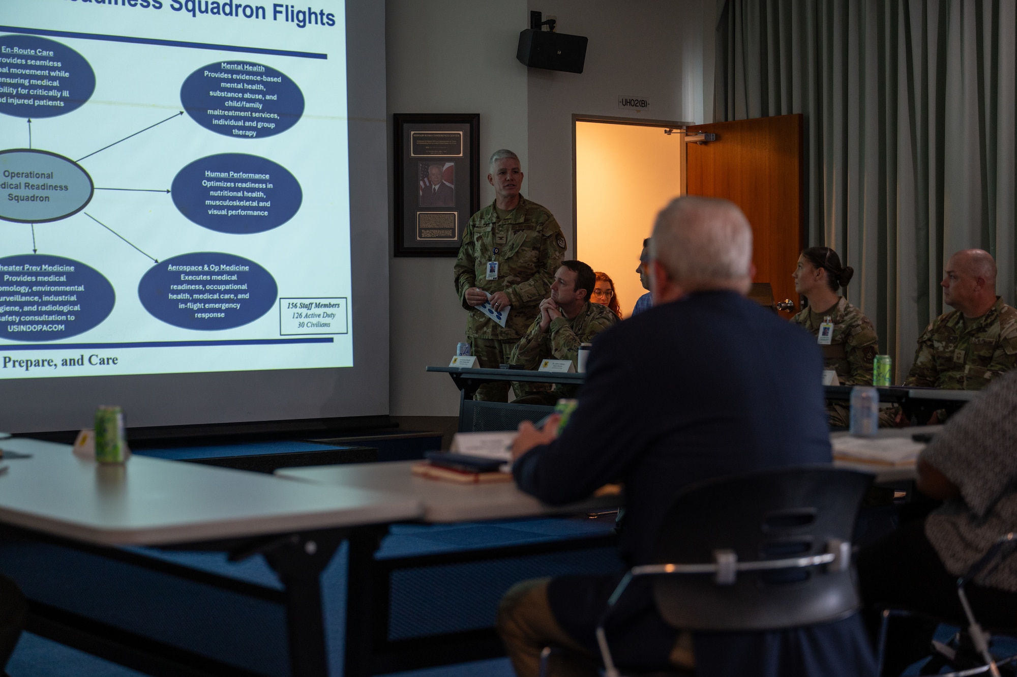 18th Medical Group member briefs House Armed Services Committee members