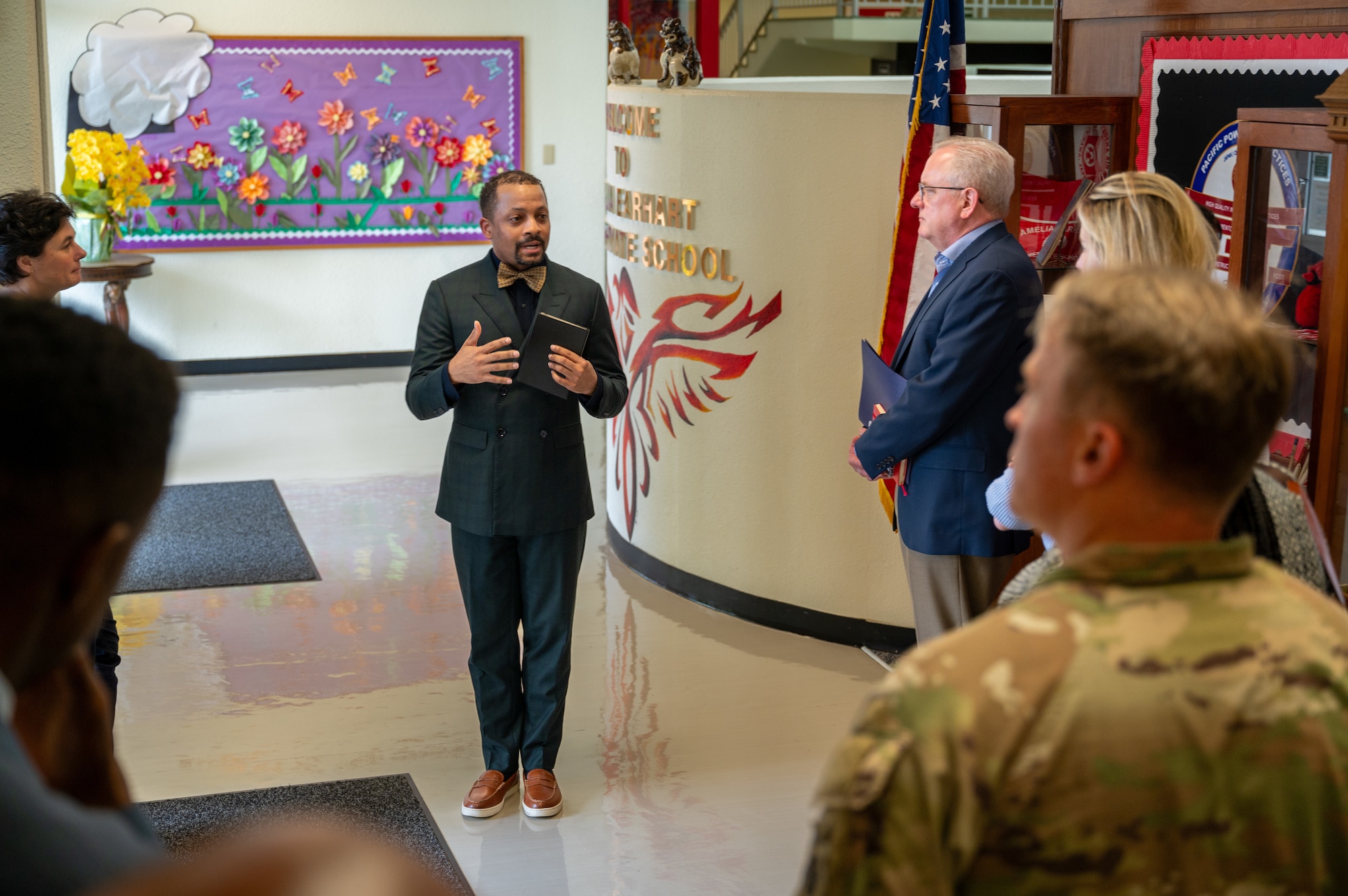 A DODEA Pacific South chief of staff briefing House Armed Services Committee members on Kadena educational standards