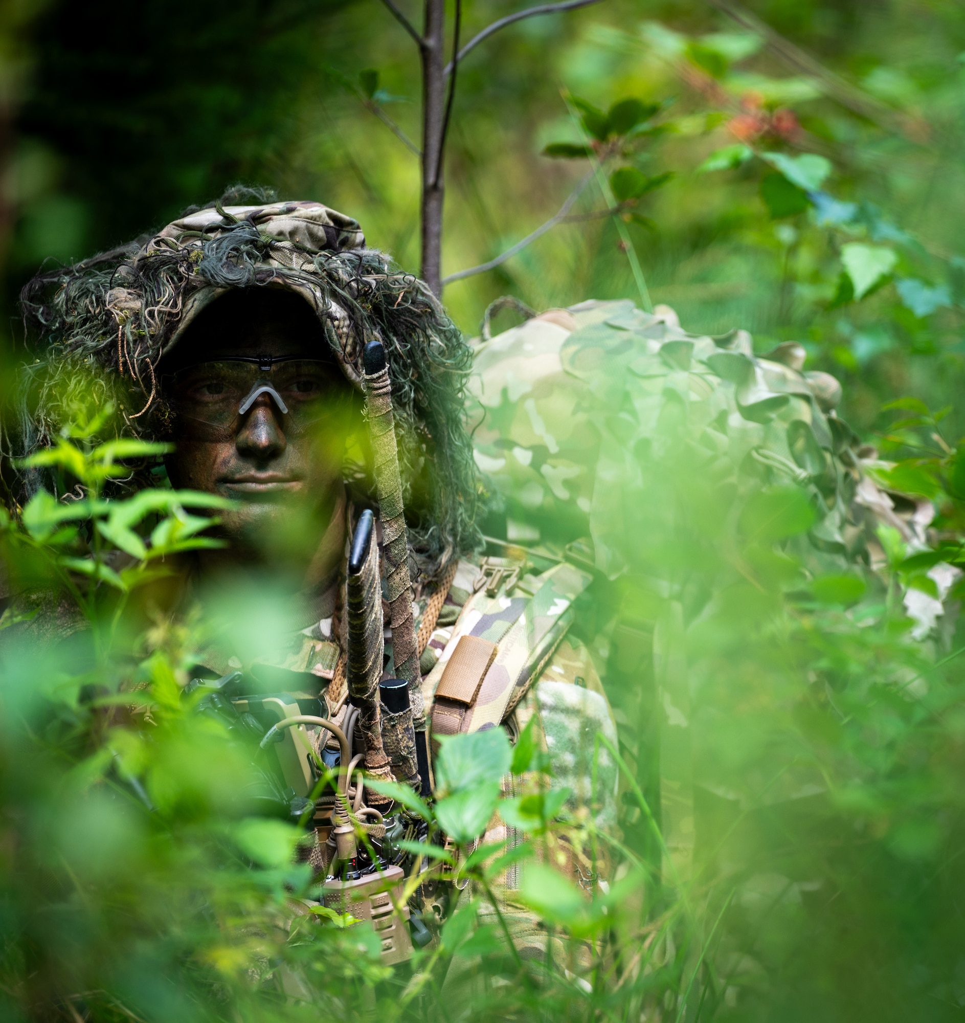 A U.S. Air Force Airman assigned to the 2nd Air Support Operations Squadron keeps watch during a reconnaissance mission at a training area near Vilseck Army Base, Germany, July 15, 2025.