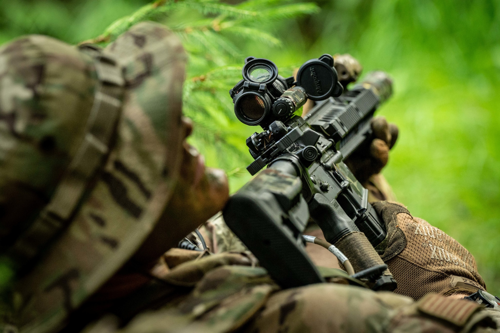 A U.S. Air Force Airman assigned to the 2nd Air Support Operations Squadron keeps watch during a reconnaissance mission at a training area near Vilseck Army Base, Germany, July 15, 2025.
