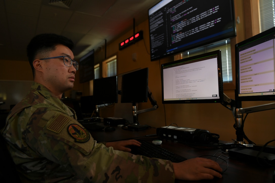 U.S. Air Force Capt. Isaac Tian, a cyber operations officer with the 262nd Cyber Operations Squadron, Washington Air National Guard, analyzes data for evidence of adversary indicators of compromise on Joint Base Lewis-McChord, Wash., April 6, 2025.