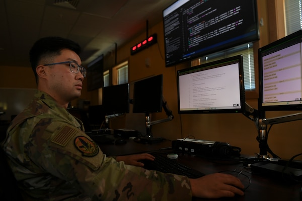 U.S. Air Force Capt. Isaac Tian, a cyber operations officer with the 262nd Cyber Operations Squadron, Washington Air National Guard, analyzes data for evidence of adversary indicators of compromise on Joint Base Lewis-McChord, Wash., April 6, 2025.
