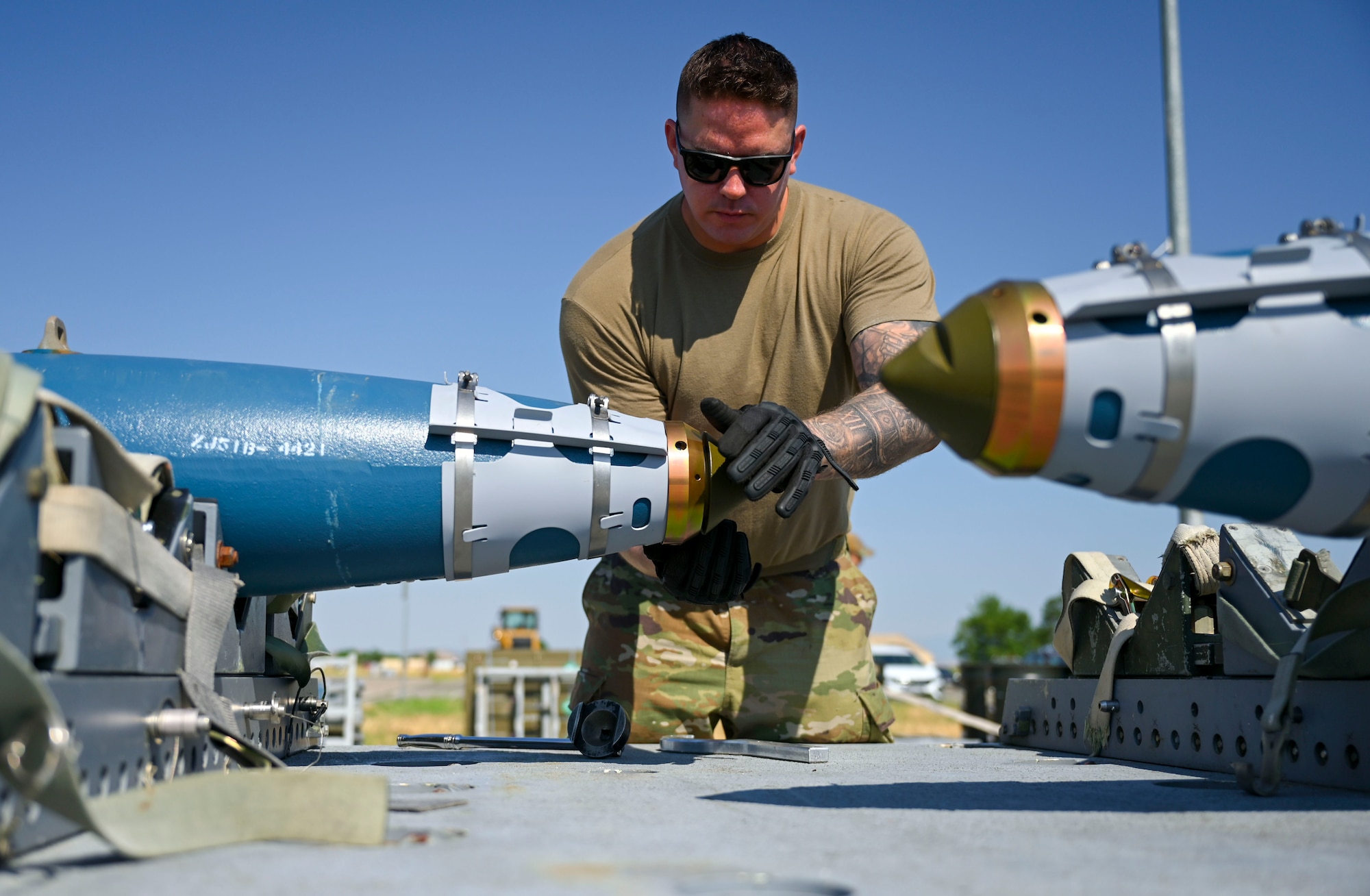 An Airman deconstructs munitions.