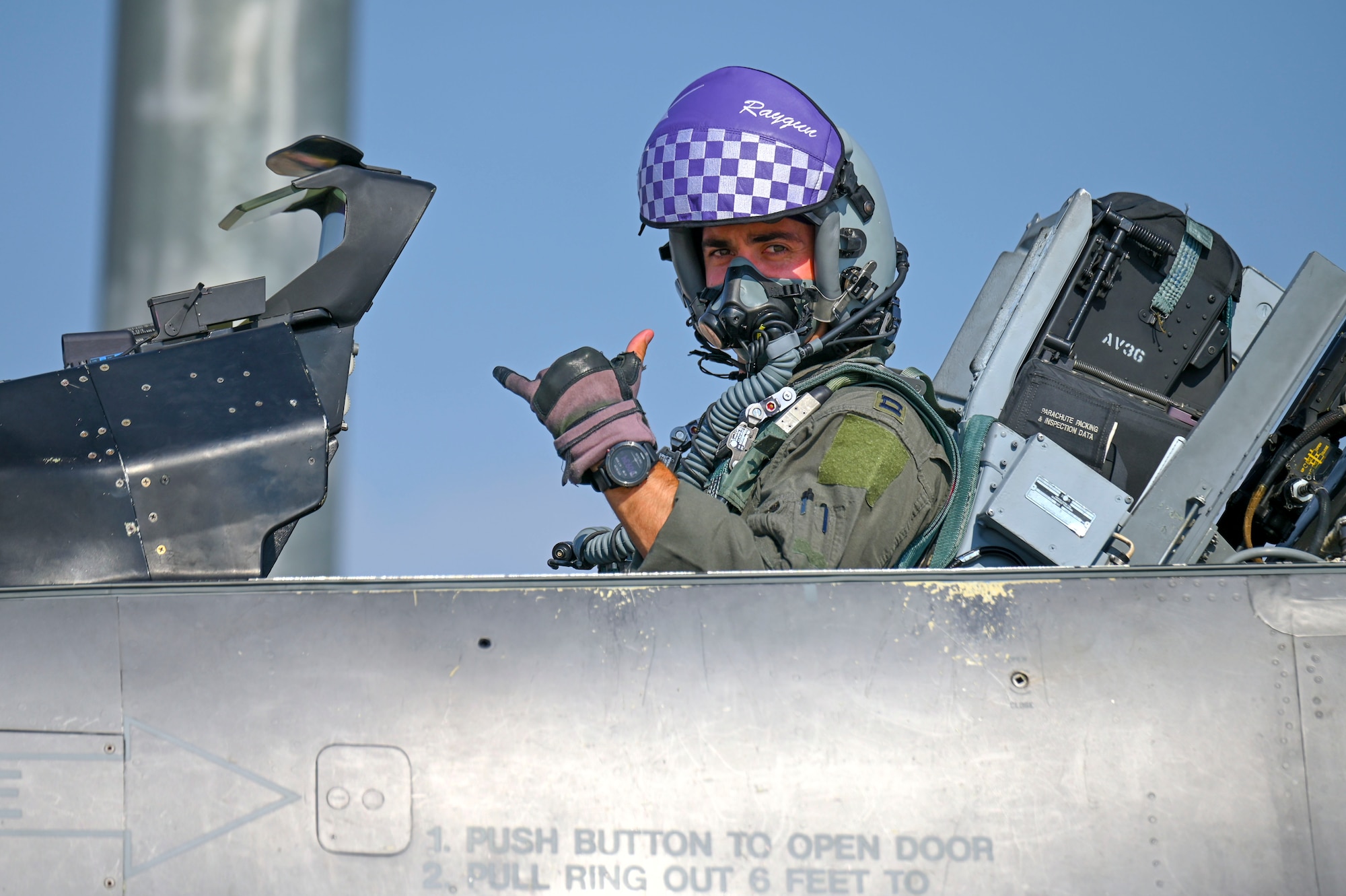 A pilot poses for a photo.
