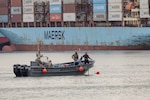 PANAMA CITY, PANAMA — U.S. Navy explosive ordnance disposal (EOD) technicians from Explosive Ordnance Disposal Mobile Unit (EODMU) 2, EOD personnel assigned to Policia National de Panama or National Police of Panama (PNP) and Servicio Nacional Aeronaval or National Aeronaval Service, conduct limpet mine exercises during PANAMAX 25, July 23, 2025. PANAMAX is a premier combined training that strengthens regional security, enhances interoperability, and reinforces integrated deterrence through combined defense of the Panama Canal, ensuring the continued security of vital global shipping lanes. (U.S. Navy photo by Mass Communication Specialist 2nd Class Jackson Adkins)