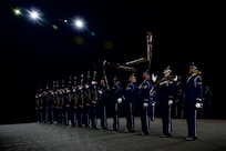 Members of the U.S. Air Force Honor Guard Drill Team conduct a line formation drill sequence during the rehearsal of the 75th Royal Edinburgh Military Tattoo in Edinburgh, Scotland, July 31, 2025.