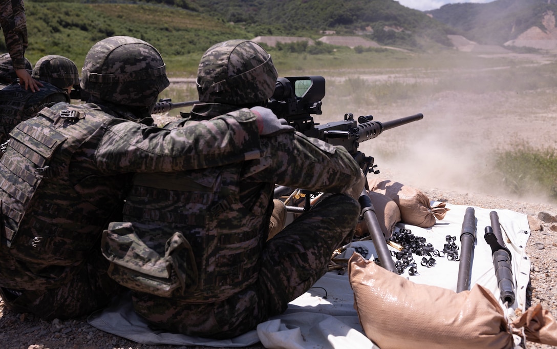 Republic of Korea Marines with 1st Marine Division, ROK Marine Corps, fire an M2 .50 caliber machine gun during the Korean Marine Exercise Program 25.2 in Pohang, South Korea, July 30, 2025. KMEP is conducted regularly between the ROK and U.S. Marine Corps to increase their combined capabilities through realistic training geared towards deterrence and maintaining peace in the Indo-Pacific. (U.S. Marine Corps photo by Cpl. Kanoa Thomas)