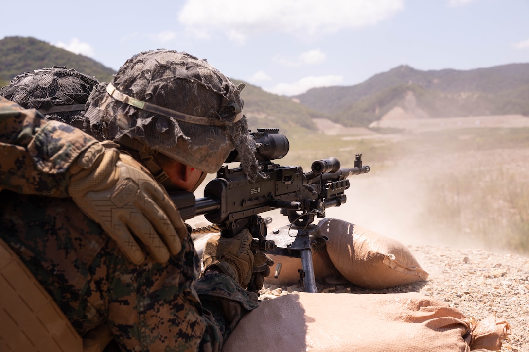 U.S. Marine Corps Lance Cpl. Jose Lopez-Santiago, a machine gunner with Golf Company, 2nd Battalion, 23rd Marines, forward deployed with 4th Marine Regiment, 3rd Marine Division as part of the Unit Deployment Program, fires an M240B machine gun drills during the Korean Marine Exercise Program 25.2 in Suseong-ri, South Korea, July 30, 2025. KMEP is conducted regularly between the ROK and U.S. Marine Corps to increase their combined capabilities through realistic training geared towards deterrence and maintaining peace in the Indo-Pacific. Lopez-Santiago is a native of California. (U.S. Marine Corps photo by Cpl. Kanoa Thomas)