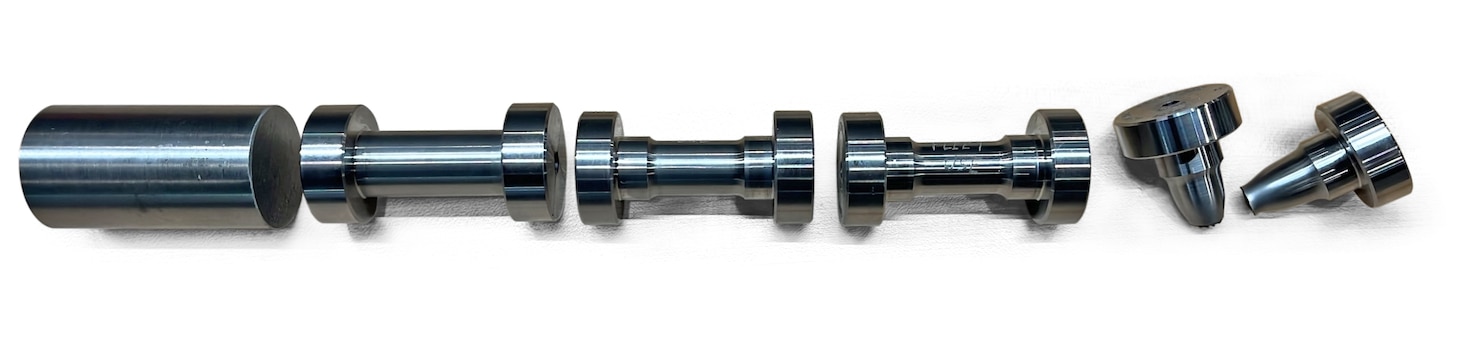 Pictured are the release elements created by the Lakehurst Prototype and Manufacturing Division. The pieces are necessary to launch C-2 Greyhounds and E-2 Hawkeyes from aircraft carriers.