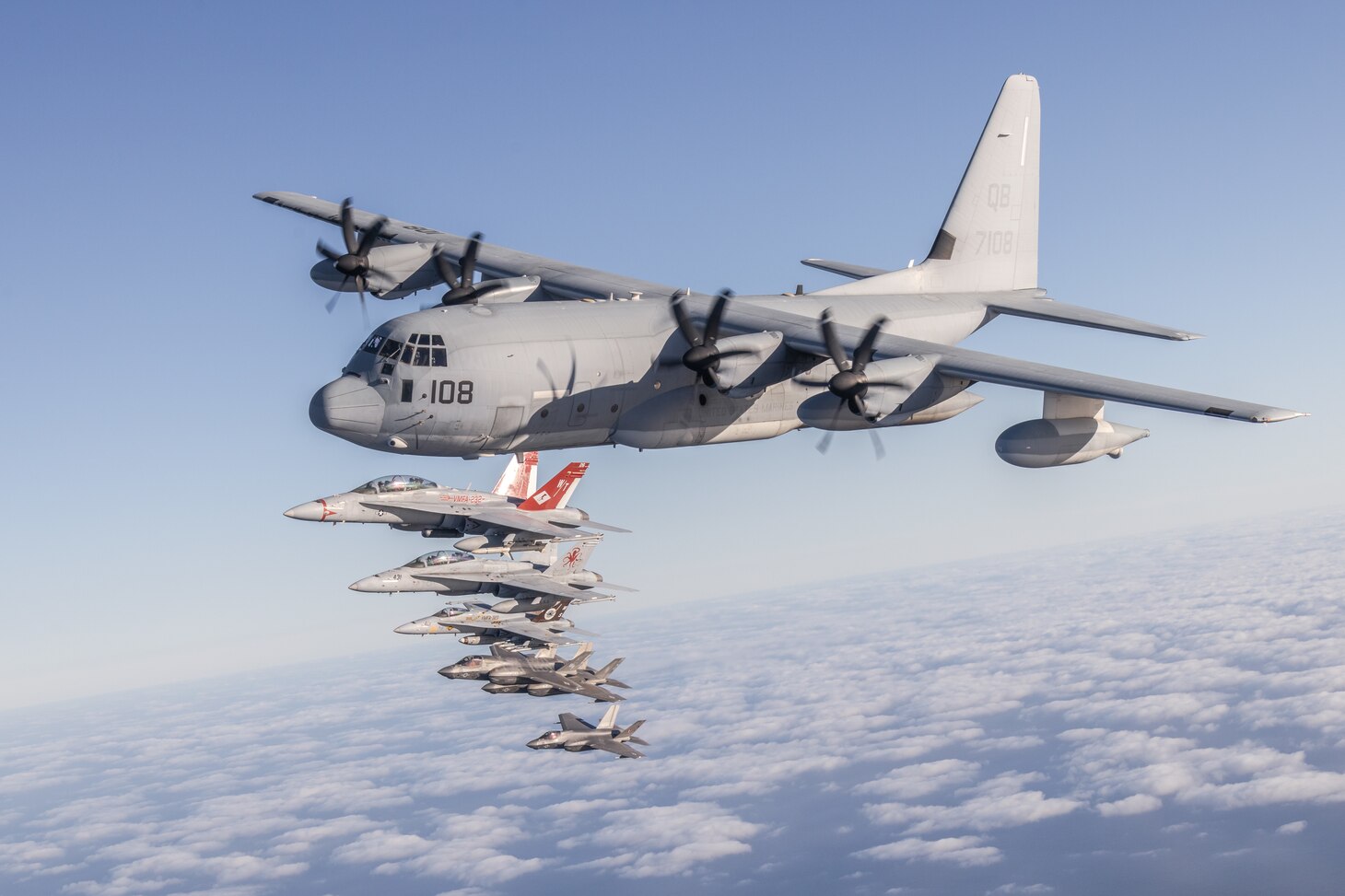 U.S. Marines and aircraft with Marine Aircraft Group 11, 3rd Marine Aircraft Wing, conduct a formation flight as part of Project Legacy off the coast of San Diego, March 4, 2025. The Project Legacy flight was a unique opportunity for all aircraft platforms across MAG-11 to fly as one team, practice tight formations, and take part in the documentation of a historical flight.