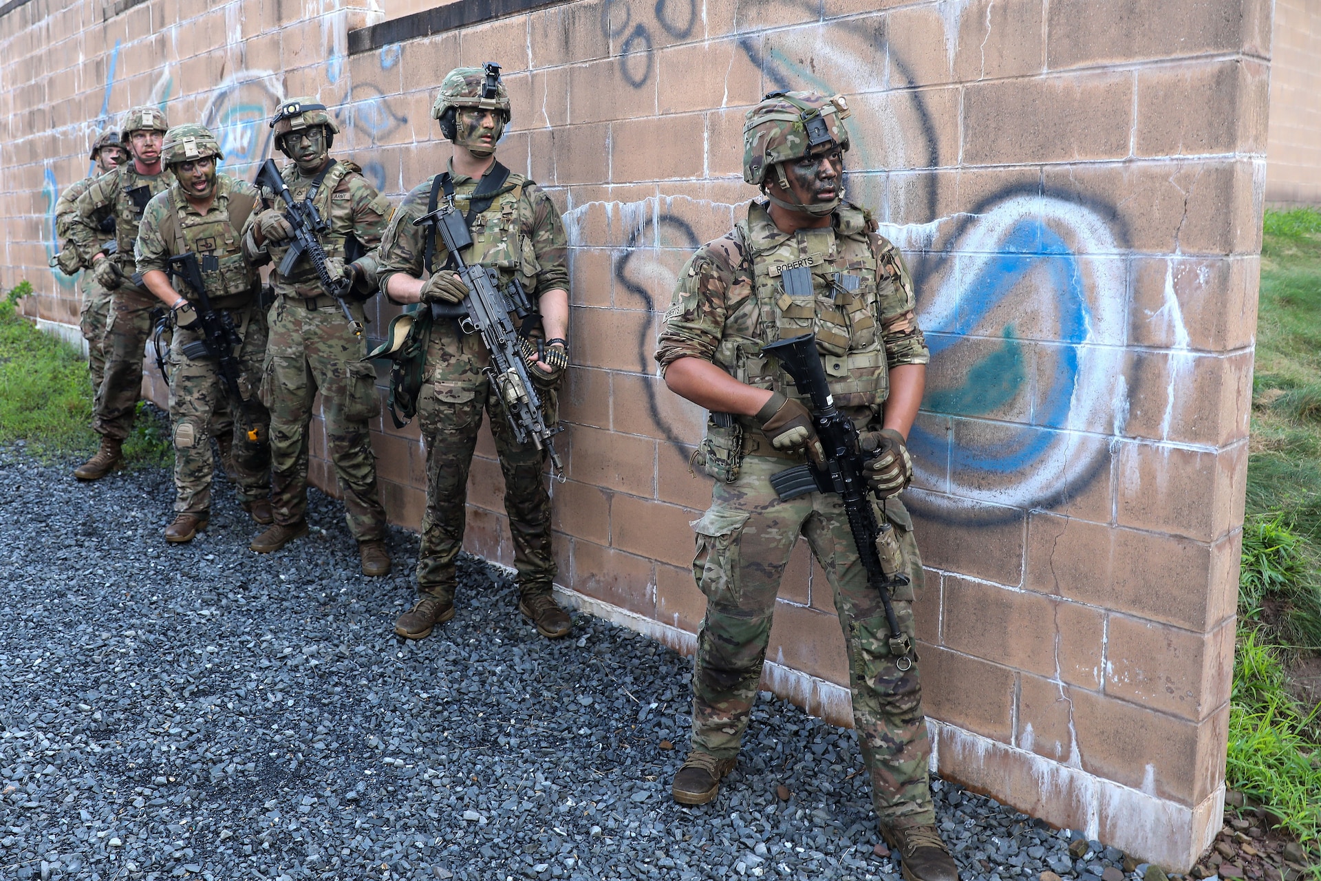 U.S. Soldiers with Charlie Company, 1st Battalion, 109th Infantry Regiment perform combat maneuvers during an exercise at Fort Indiantown Gap, Pennsylvania, July 30, 2025. The Soldiers trained in an intensive 96 hour force-on-force exercise to simulate combat against a capable adversary. (U.S. Army National Guard photo by Staff Sgt. Zachery Jockel)