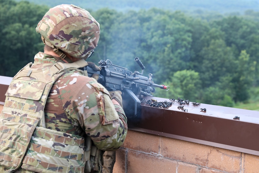 A U.S. Soldier with Charlie Company, 1st Battalion, 109th Infantry Regiment fires an M240 machine gun during an exercise at Fort Indiantown Gap, Pennsylvania, July 30, 2025. The Soldiers trained in an intensive 96 hour force-on-force exercise to simulate combat against a capable adversary. (U.S. Army National Guard photo by Staff Sgt. Zachery Jockel)