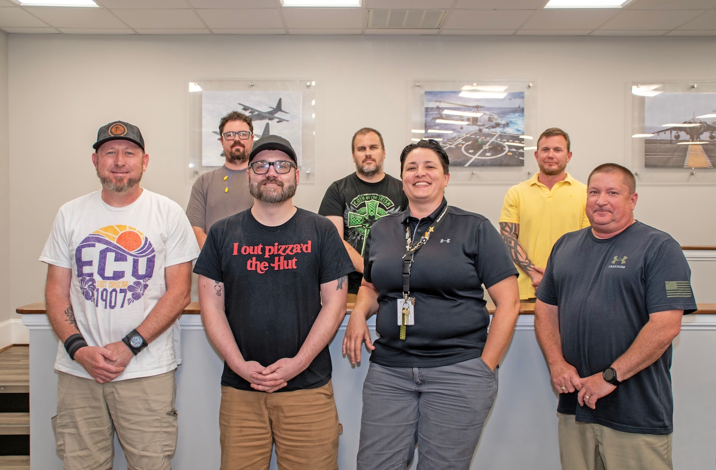 Members of the Fleet Readiness Center East (FRCE) Maintenance, Repair and Overhaul Production Department workforce who earned recognition for their contributions to the Beneficial Suggestion Program included, from left to right: Jason Hollingsworth, Patrick Baker, Robert Conley, Randall Chaney, Crystal Gent, Horace Jackson and Christopher Murphy.