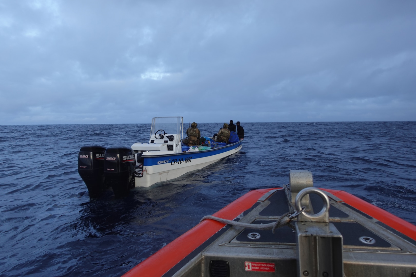 A U.S. Coast Guard Cutter Escanaba (WMEC 907) boarding team boarding a vessel suspected of drug smuggling in the eastern Pacific. The drugs were offloaded at Port Everglades, Florida, August 5, 2025. (U.S. Coast Guard photo)