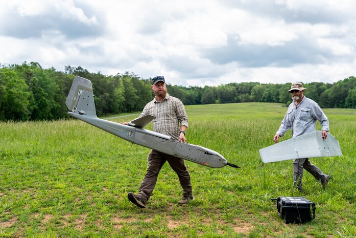 U.S. Marines with Marine Corps Advisor Company-A (MCAC-A) learn the capabilities and limitations of unmanned aerial systems (UAS) assets at Camp Upshur, Marine Corps Base Quantico, Va., May 15, 2025. Members of the Marine Corps Warfighting Laboratory support and educate MCAC-A Marines on UAS assets to increase their ability to advise and support foreign security forces. (U.S. Marine Corps photo by Connor Taggart)
