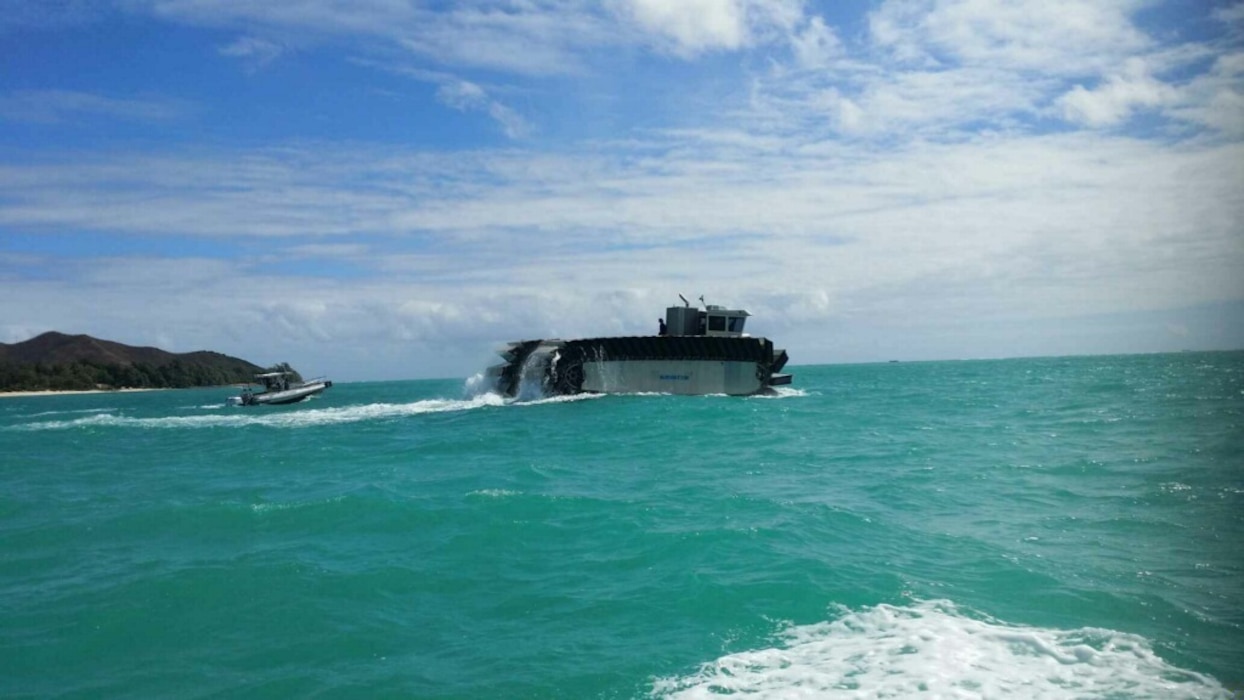 The Ultra Heavy-Lift Amphibious Connector makes its way toward the USS Rushmore to pick up heavy logistics gear and ITV to support operations on Marine Corps Training Area Bellows, Hawaii, during the Marine Corps Warfighting Lab’s Advanced Warfare Experiment, July 11, 2014. (Marine Corps Photo by Cpl. Matthew J. Bragg)
