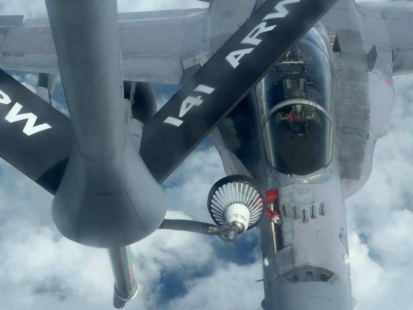 A Royal Malaysian Air Force SU-30MKM refuels from a 141st Air Refueling Wing KC-135 Stratotanker in the skies above Malaysia, November 13, 2024.